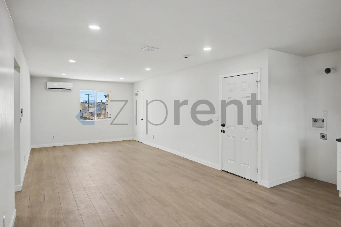 242 1/2 E 97th St - Photo 2 of 8