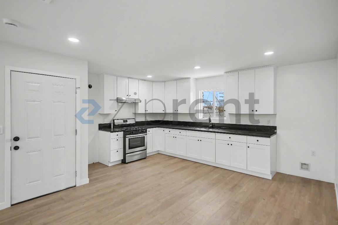 242 1/2 E 97th St - Photo 5 of 8