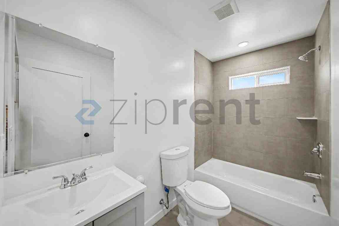 242 1/2 E 97th St - Photo 6 of 8