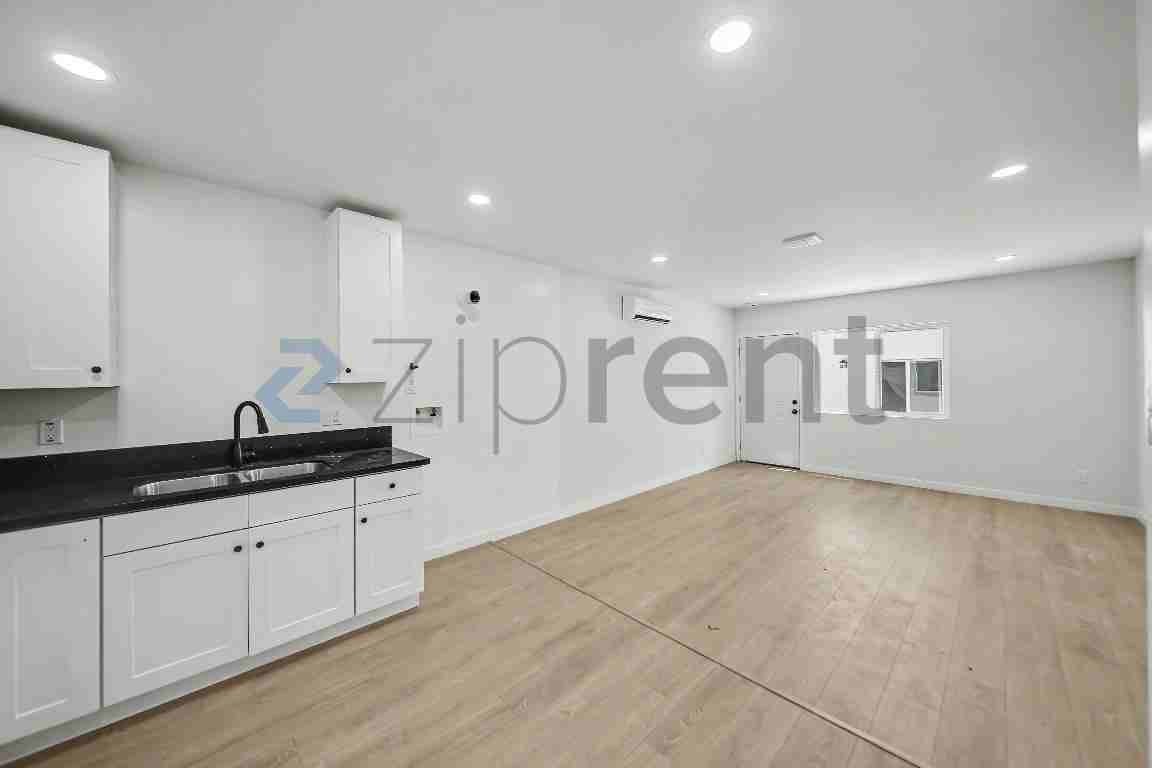 244 1/2 E 97th St - Photo 4 of 10