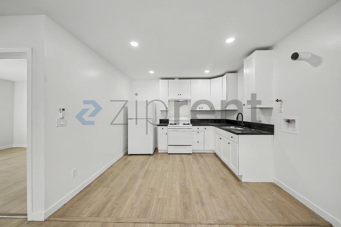 244 1/2 E 97th St - Photo 5 of 10