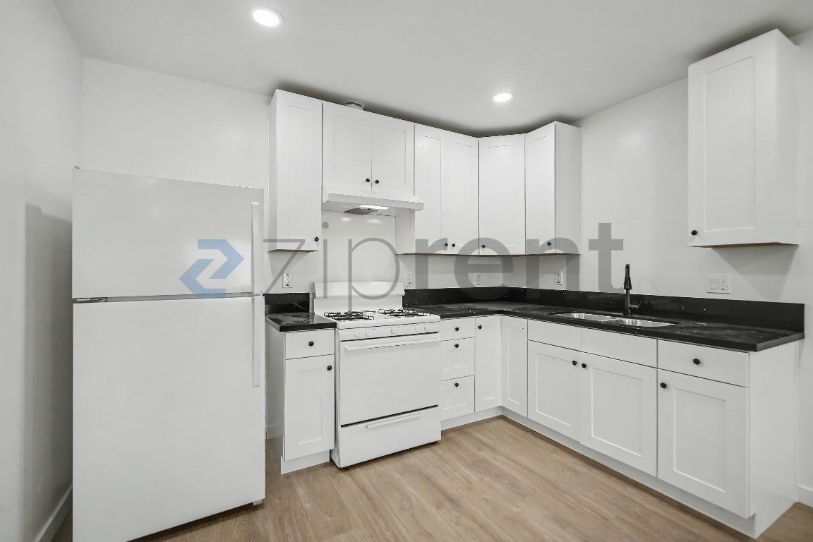 244 1/2 E 97th St - Photo 6 of 10