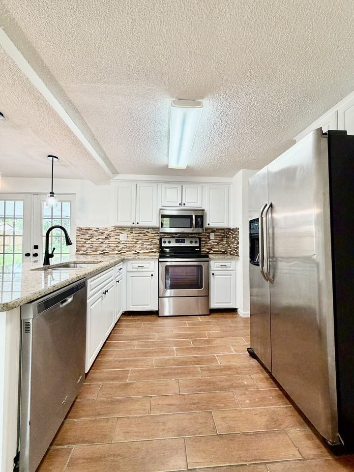 7201 Daggett Ter #1 - Photo 3 of 29