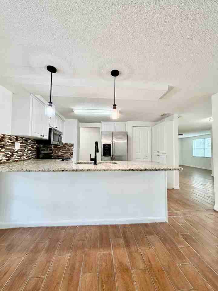 7201 Daggett Ter #1 - Photo 5 of 29