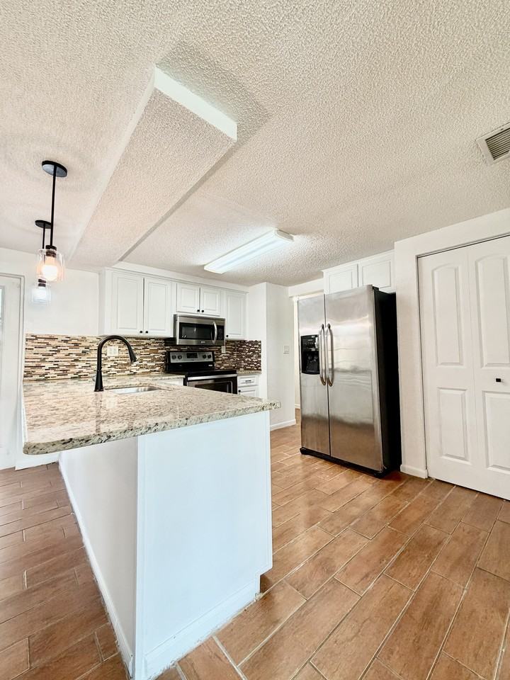 7201 Daggett Ter #1 - Photo 6 of 29