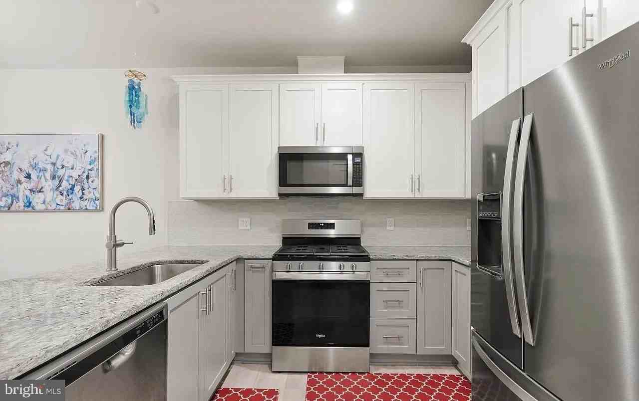 7461 Backett Wood Ter #1213 - Photo 6 of 32