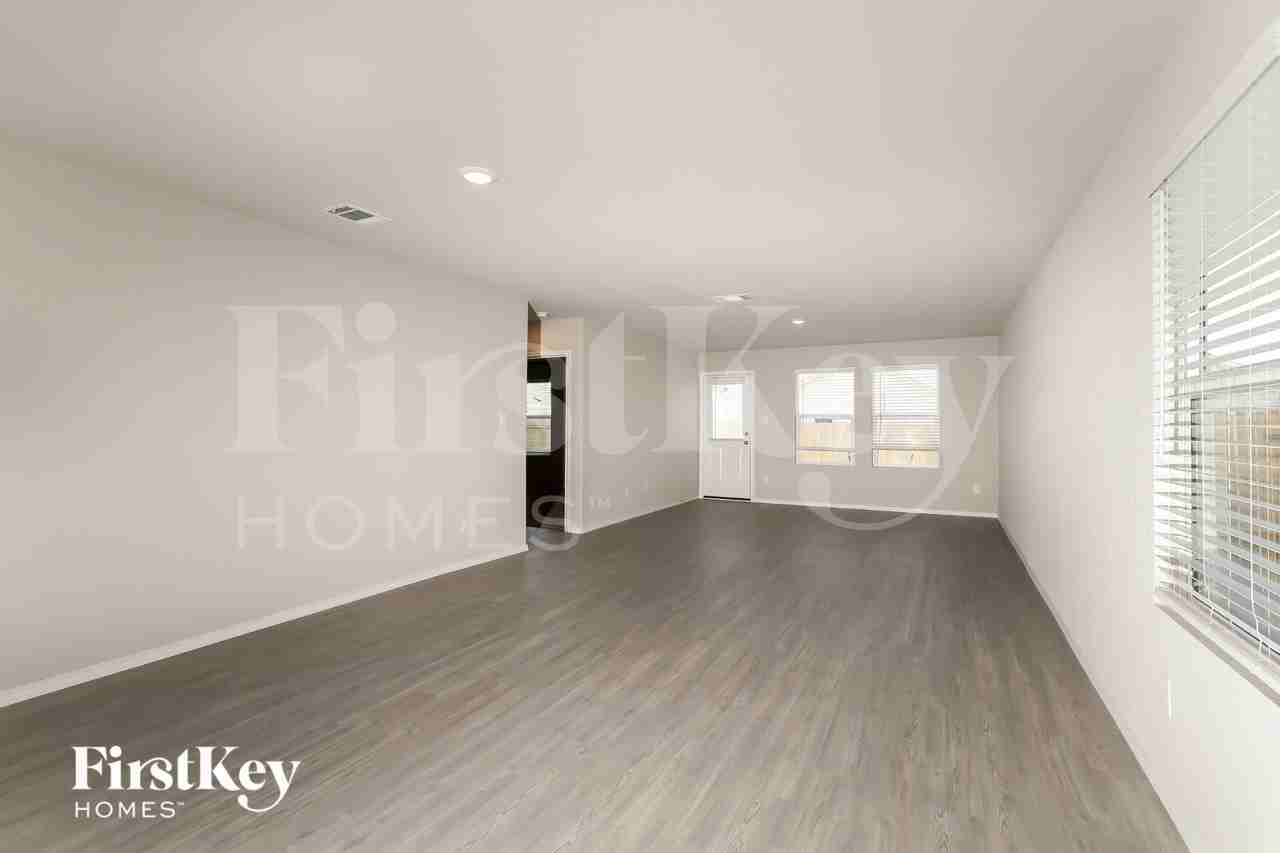 10610 Varmus Dr - Photo 3 of 16
