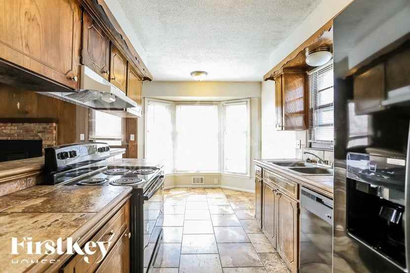 9021 E 90th Ter - Photo 5 of 15