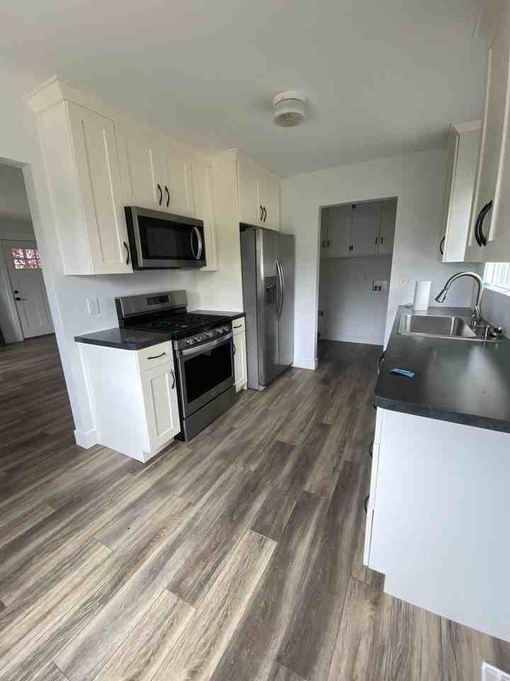 6825 S Jefferson St - Photo 2 of 20