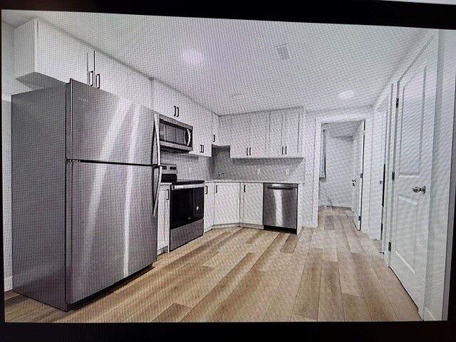 80 Legacy Reach Cres Se - Photo 3 of 7