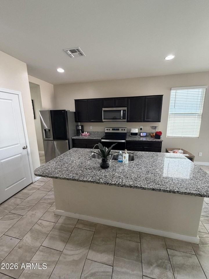 7836 W Riverside Ave - Photo 6 of 24