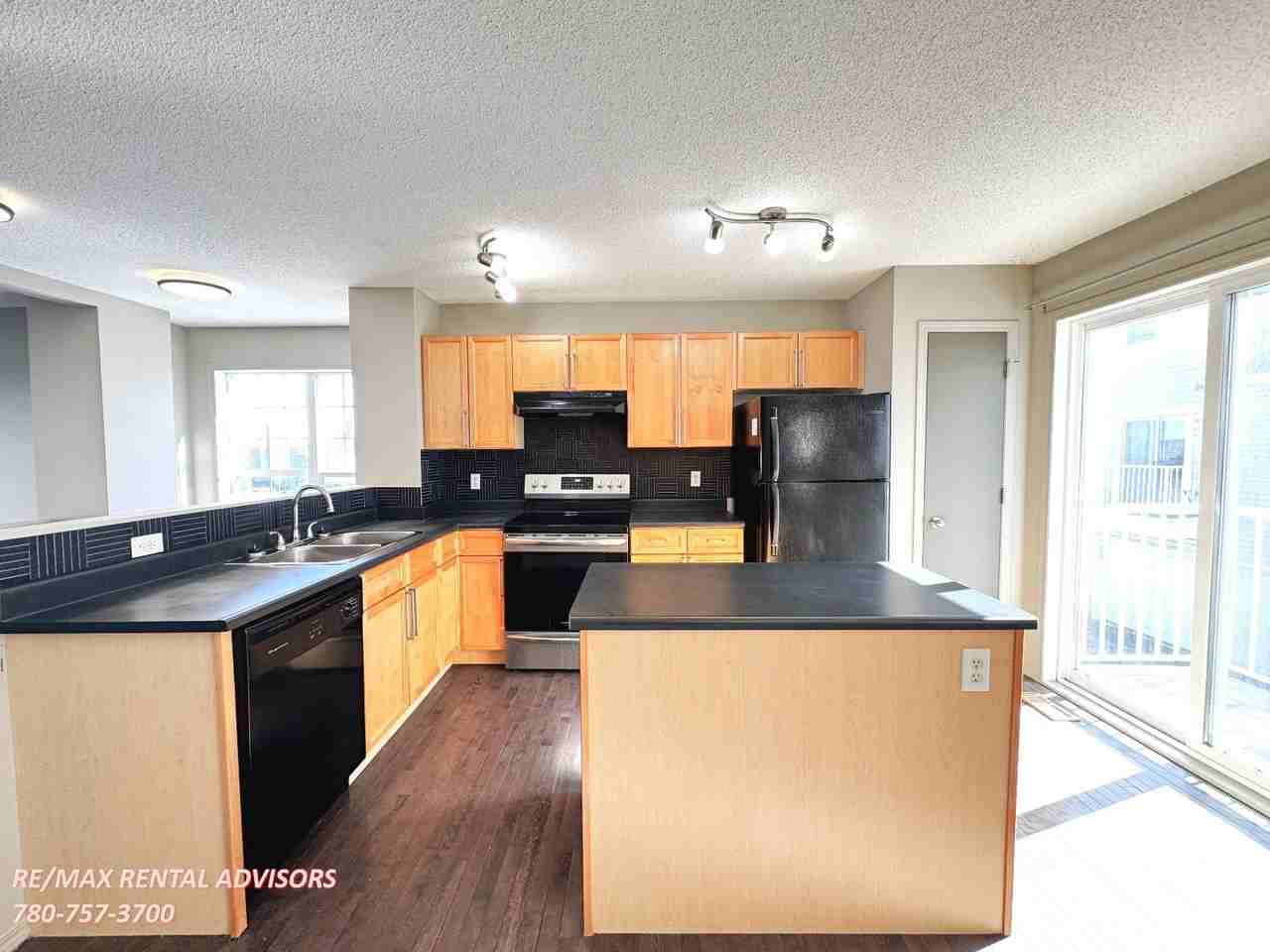 #1 5604 199 Street Northwest - Photo 2 of 16