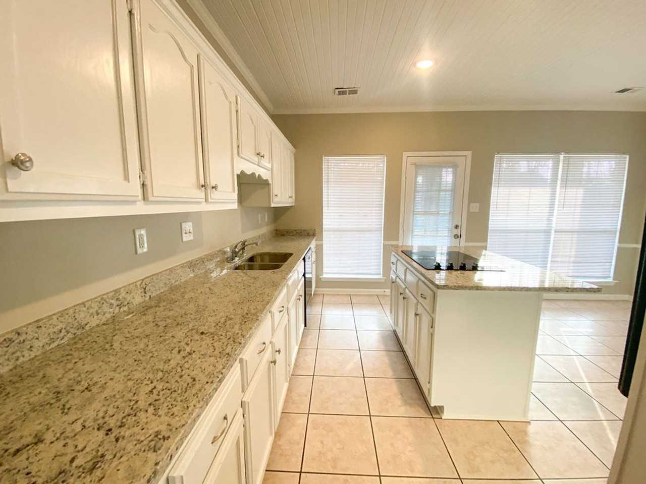 5561 Patsy Cir W - Photo 4 of 16