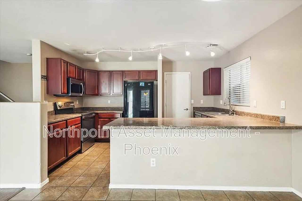 4906 N 113th Dr - Photo 5 of 25