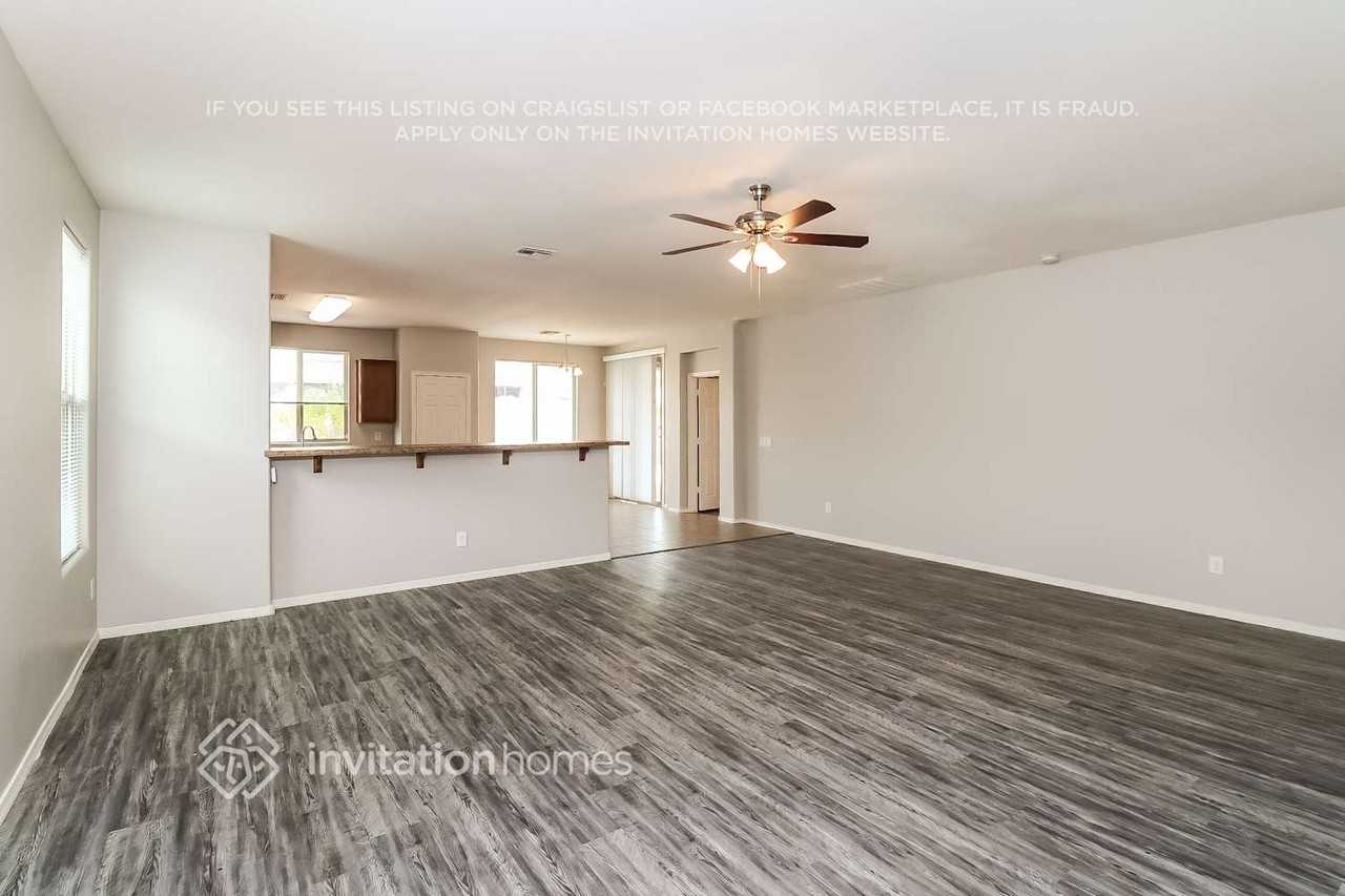 6778 W Wethersfield Rd - Photo 3 of 16