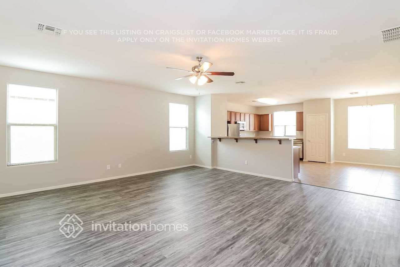 6778 W Wethersfield Rd - Photo 4 of 16