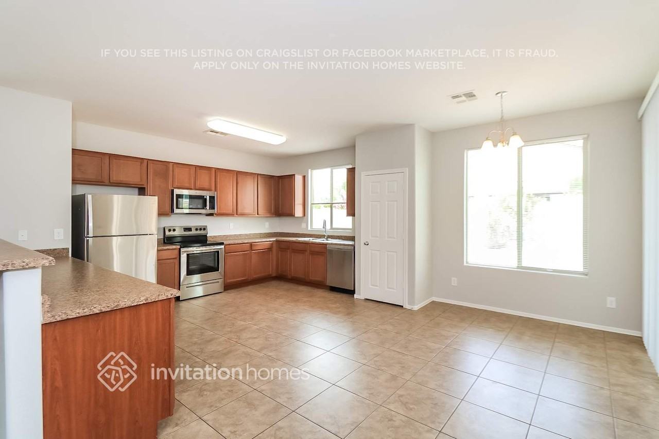 6778 W Wethersfield Rd - Photo 6 of 16