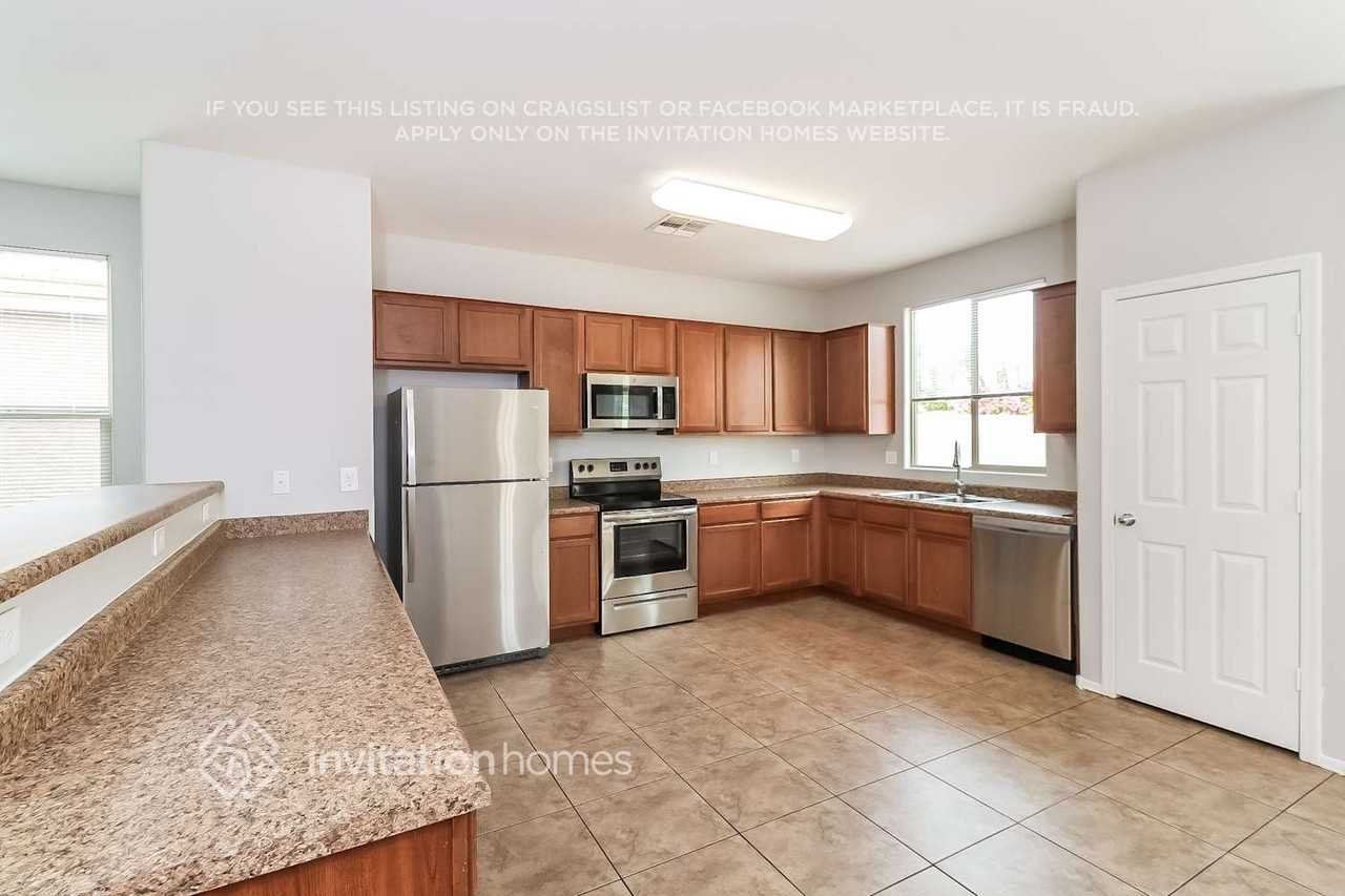 6778 W Wethersfield Rd - Photo 7 of 16