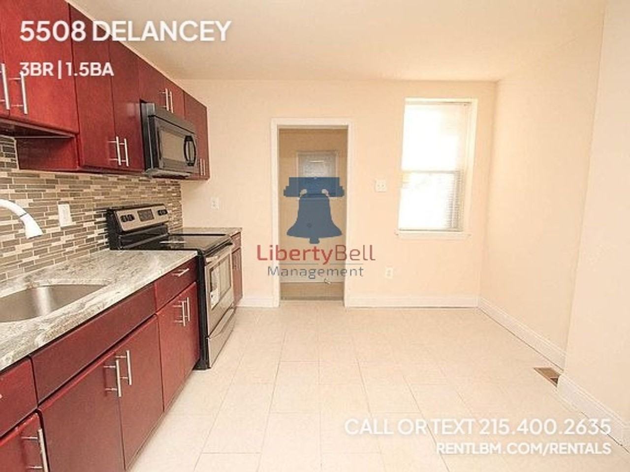 5508 Delancey St - Photo 2 of 24