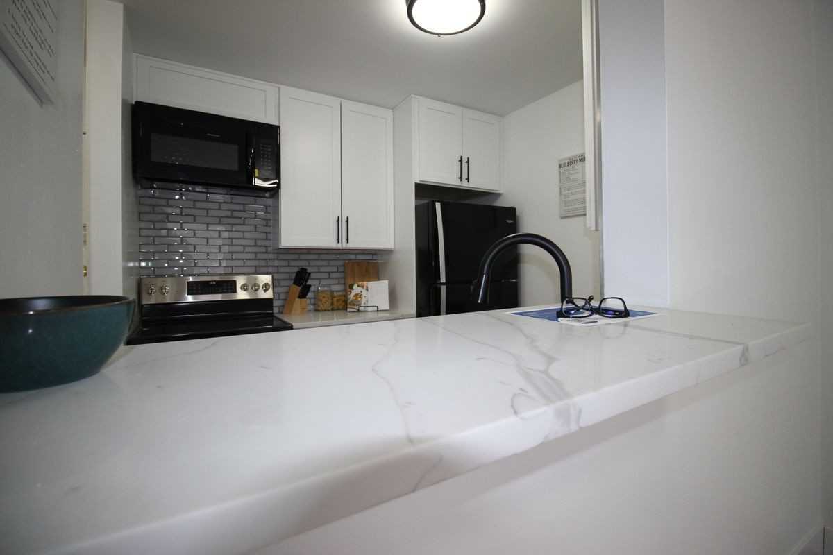2281 S Vaughn Way - Photo 3 of 13