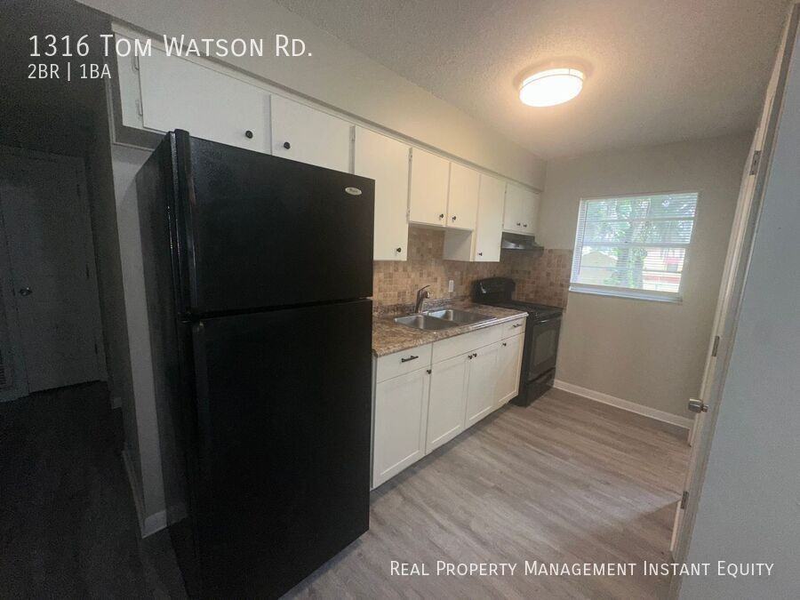1316 Tom Watson Rd - Photo 5 of 14