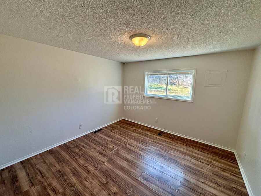 6172 E 64th Pl - Photo 5 of 9