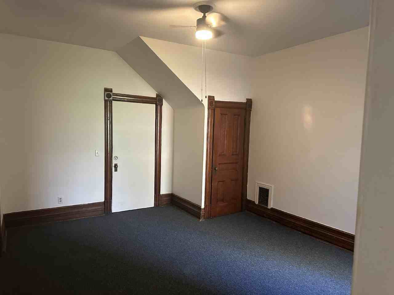 115 E 3rd St - Photo 4 of 8