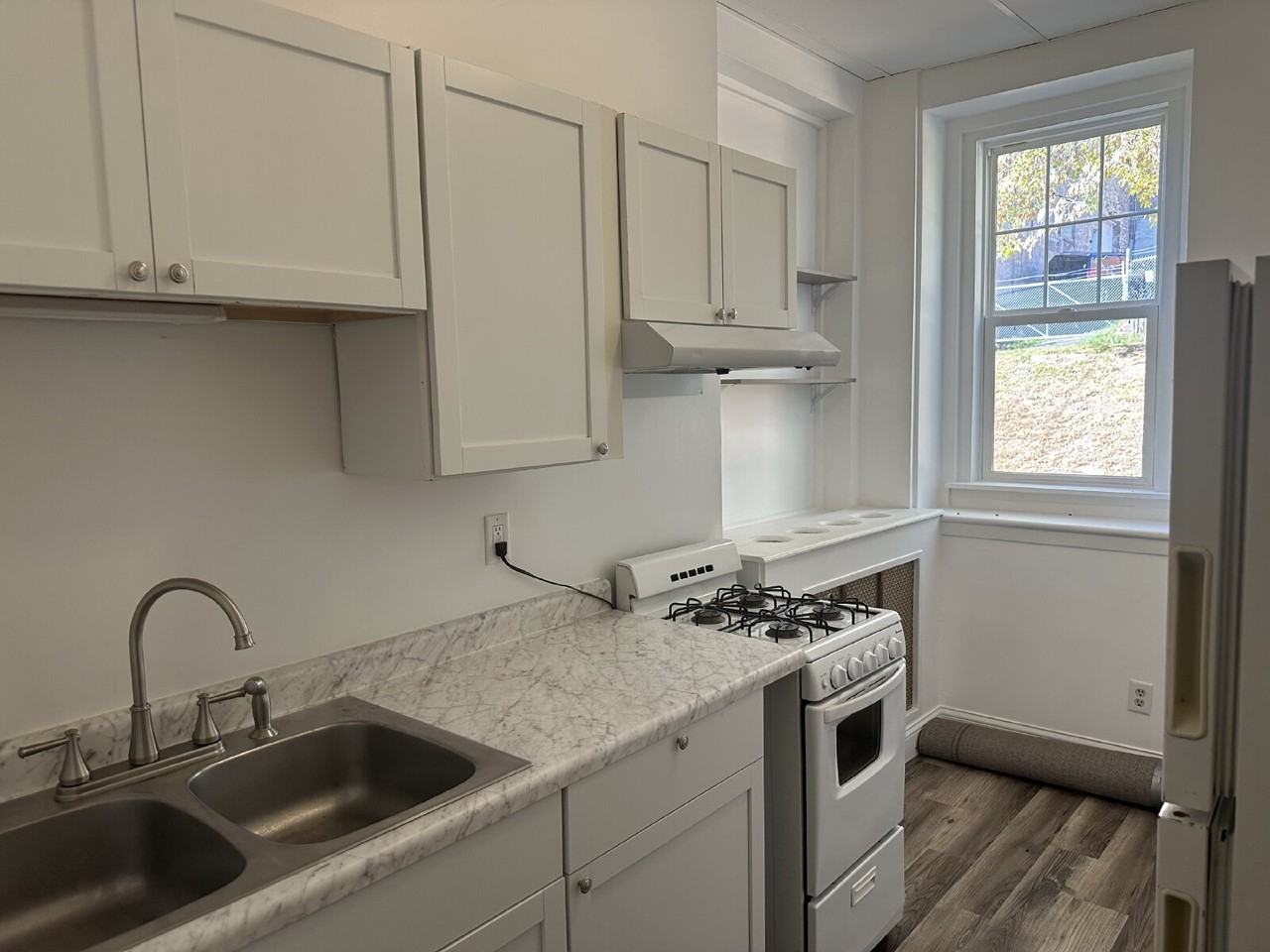 115 E 3rd St - Photo 7 of 8