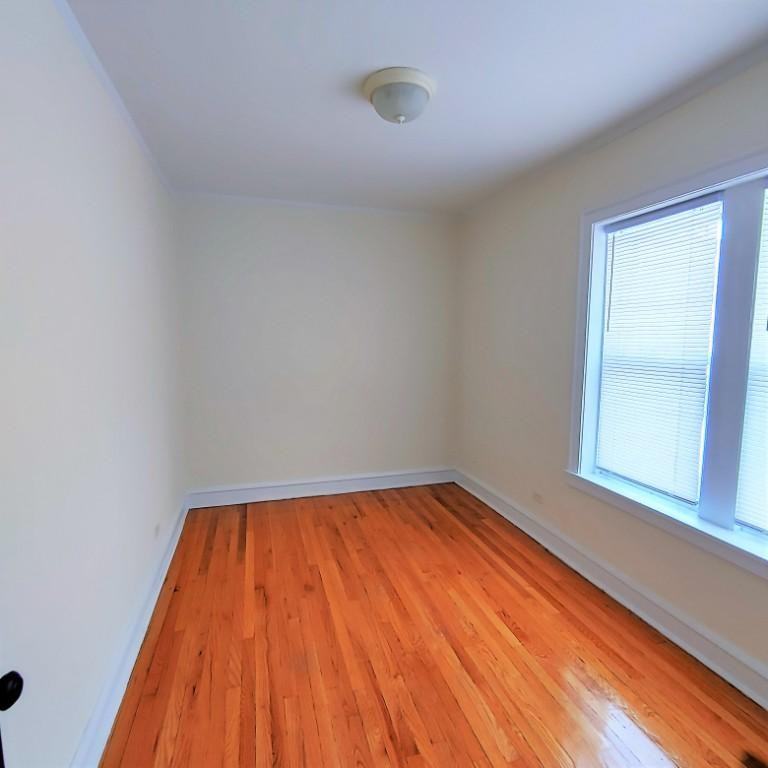 2721 N Kostner Ave - Photo 4 of 10