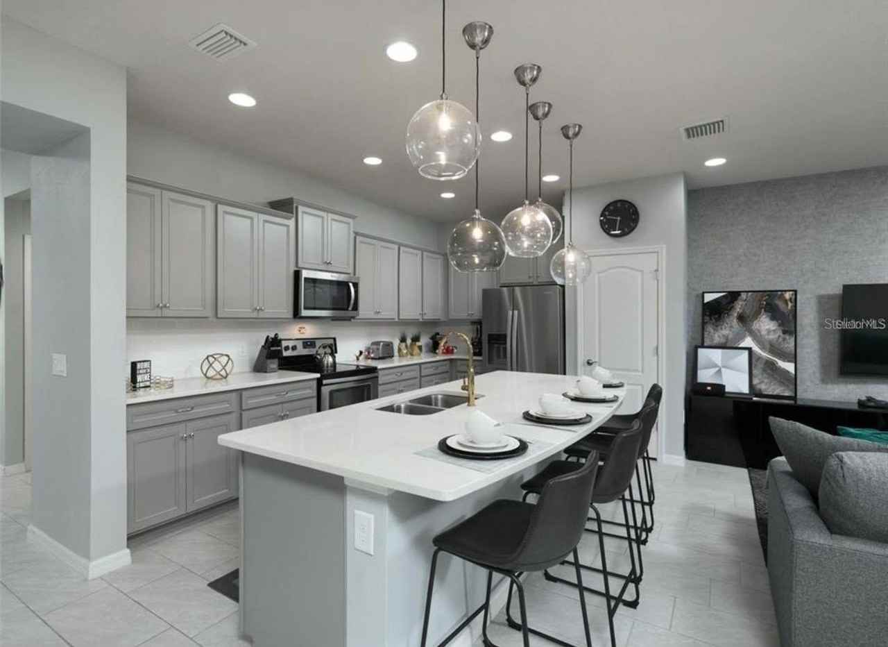8831 Geneve Ct - Photo 3 of 47