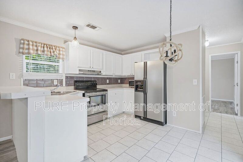 4820 Ne 141st Ter - Photo 7 of 24
