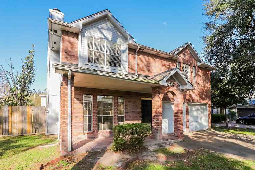 8206 Holmwood Dr - Photo 4 of 17