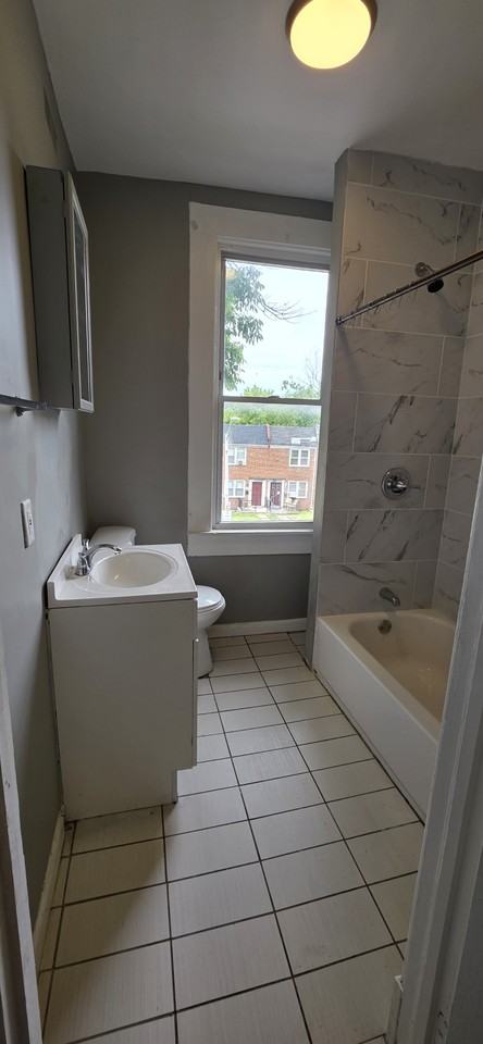 1075 Ellicott Dr - Photo 5 of 17