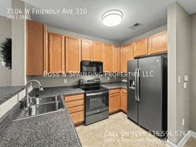 7104 W Friendly Ave - Photo 1 of 1