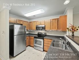 7104 W Friendly Ave - Photo 1 of 1