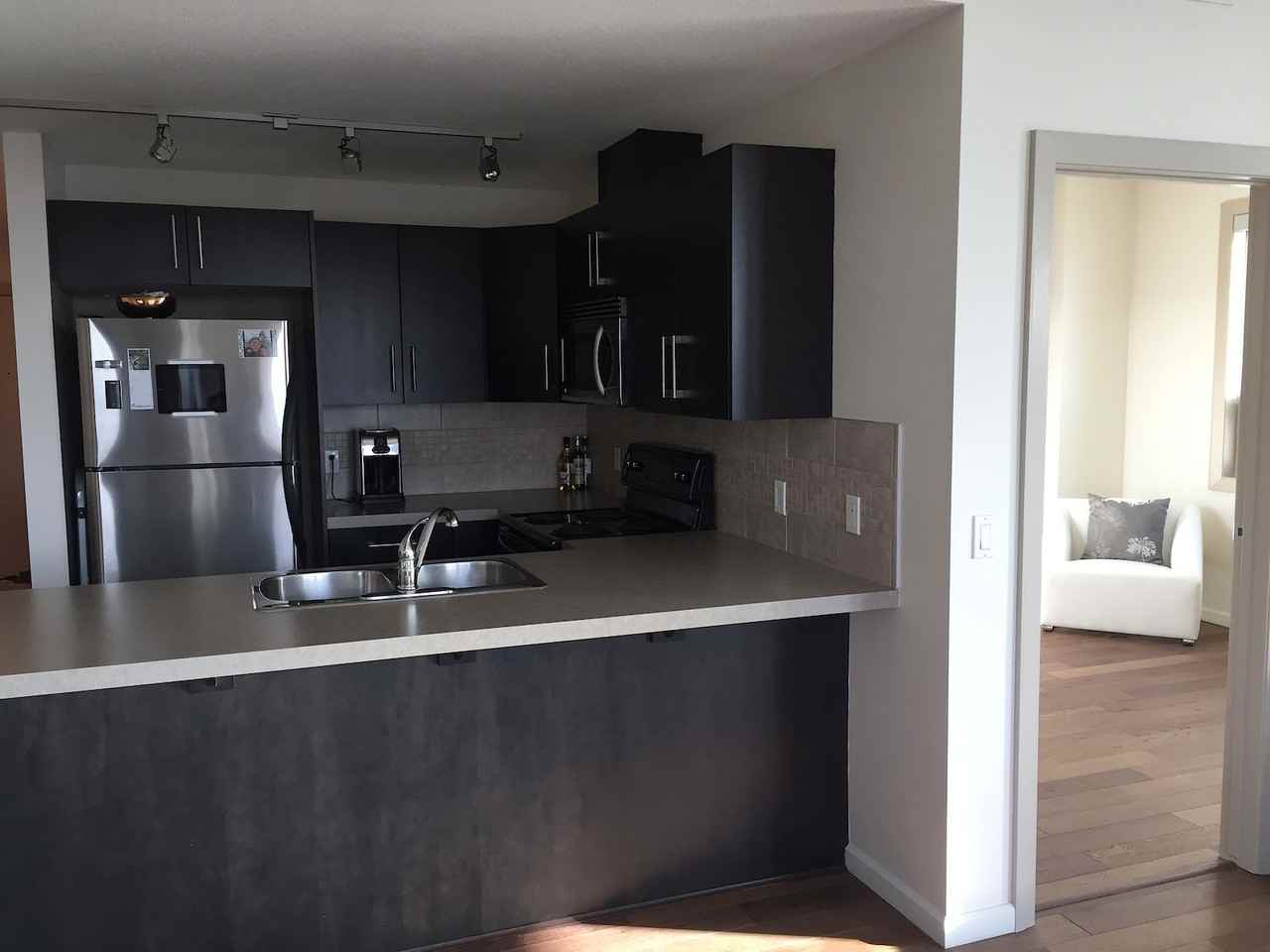 210 - 210 15 Ave Se - Photo 5 of 14
