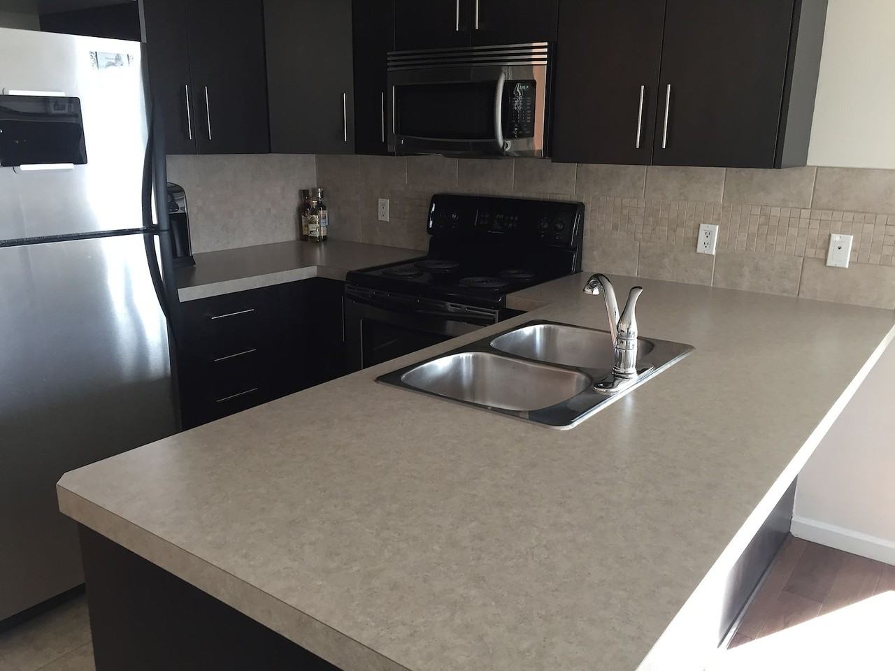 210 - 210 15 Ave Se - Photo 6 of 14