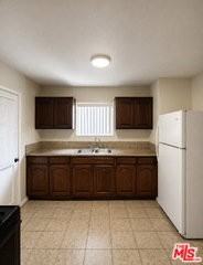 1512 W 103rd St - Photo 6 of 8