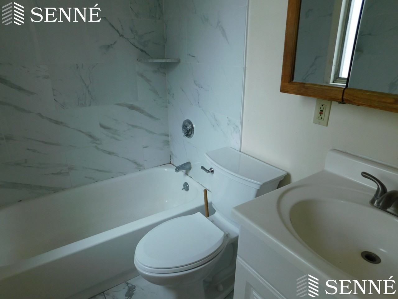 10 Gilmore St #3 - Photo 5 of 9