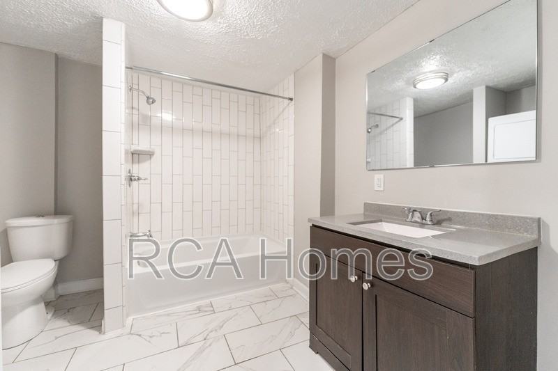 1027 Saint Paul St - Photo 6 of 11