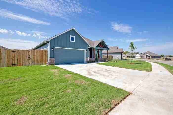 10702 N 120th East Ave - Photo 3 of 50