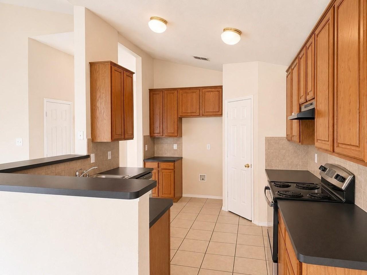 1406 Millbrook Ln - Photo 6 of 13