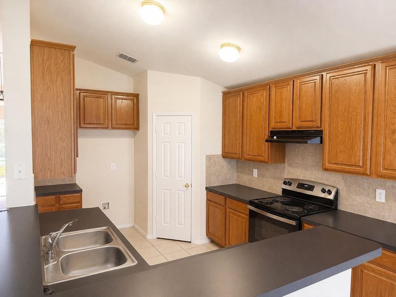 1406 Millbrook Ln - Photo 7 of 13