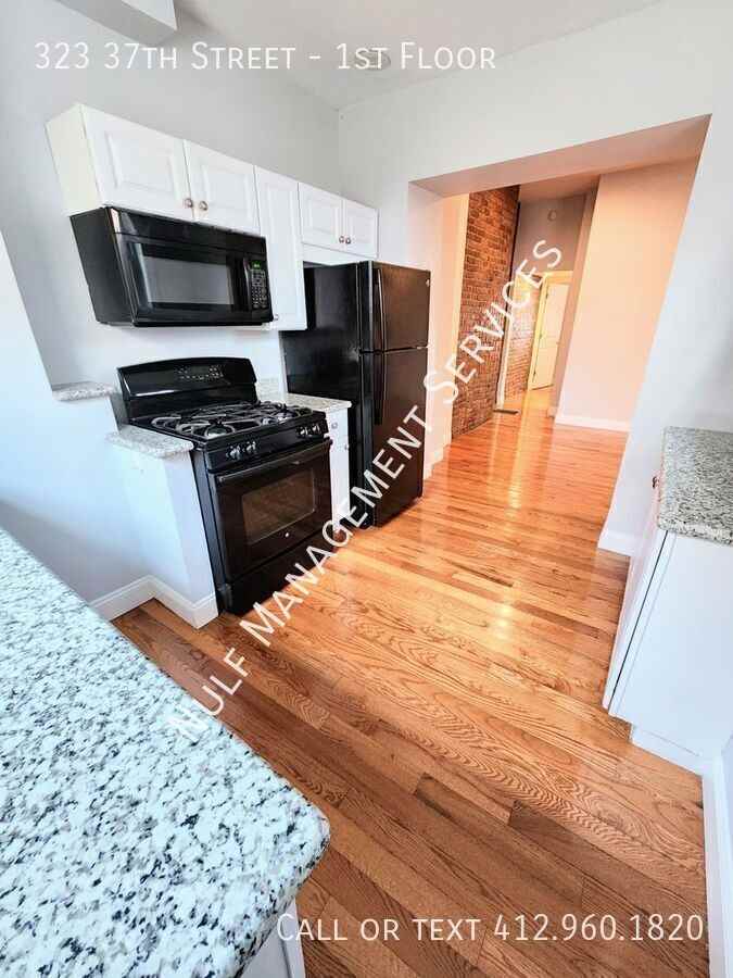 323 37th St #1stFL - Photo 2 of 8