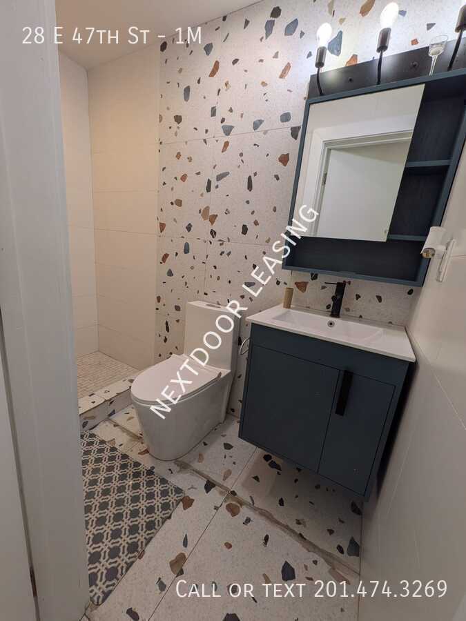 28 E 47th St #1M - Photo 2 of 12