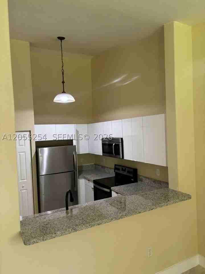 1568 Se 26th St #204 - Photo 4 of 18