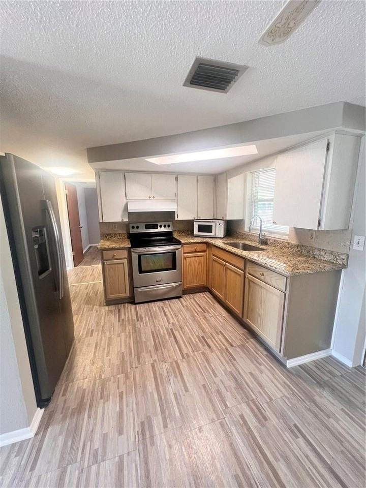 9910 Lake Chrise Ln - Photo 2 of 13