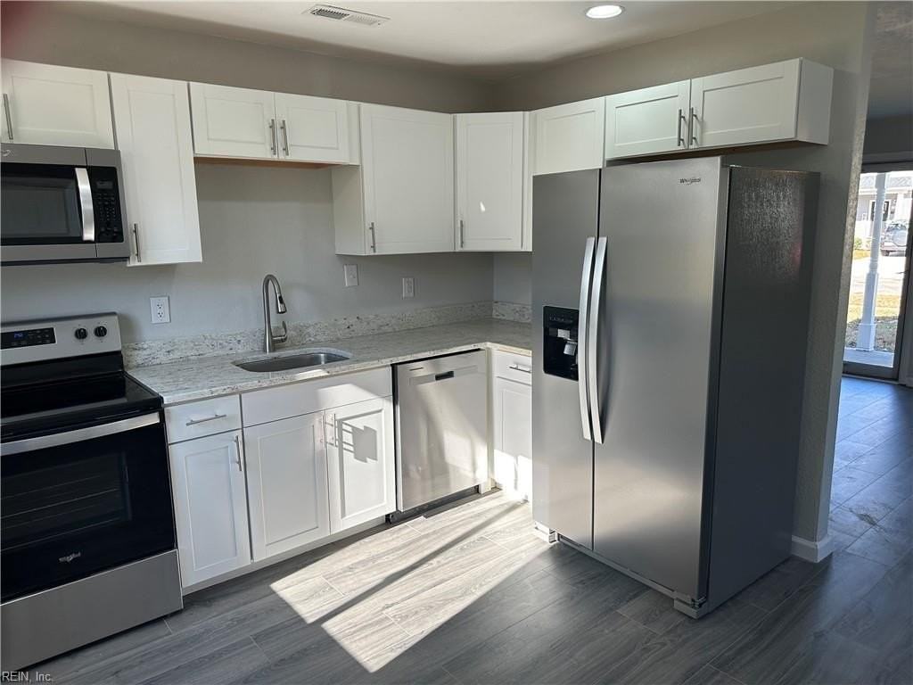 1265 W 40th St - Photo 7 of 23