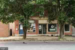 featured image of 40 W Main St