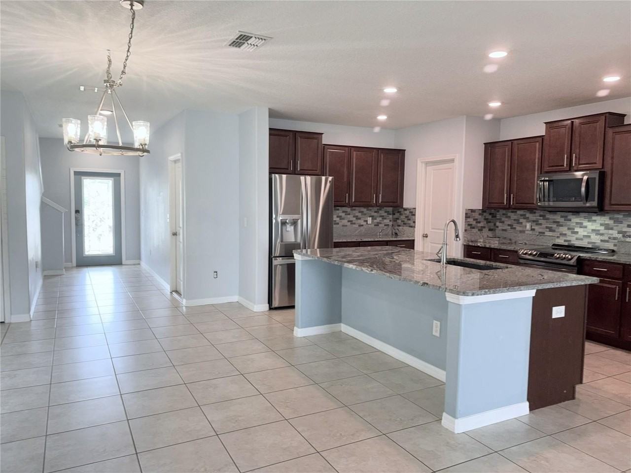 4935 Reflecting Pond Cir - Photo 3 of 41
